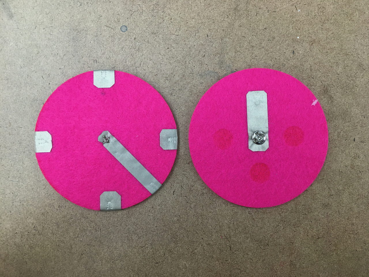 Bottom halves of a felt dial